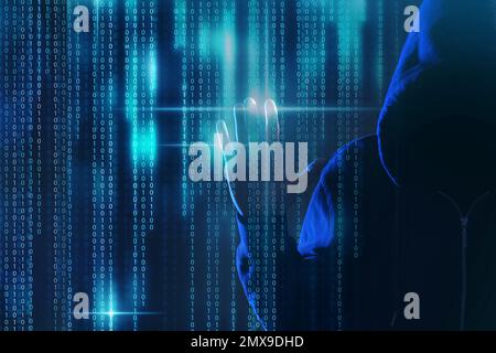 Hacker and digital binary code on dark background. Cyber crime concept Stock Photo