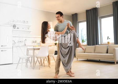 Lovely young interracial couple dancing in their new house Stock Photo