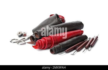 Leather samples and craftsman tools isolated on white Stock Photo
