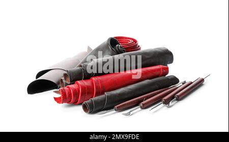 Leather samples and craftsman tools isolated on white Stock Photo