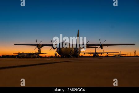 Three U.S. Air Force C-130J Super Hercules aircraft and a Spanish Casa C-295 aircraft sit on the flightline in Zaragoza, Spain during exercise Chasing Sol, Jan. 31, 2023. Exercises like Chasing Sol improve coordination with allies and partners by increasing capabilities, readiness and responsiveness. (U.S. Air Force photo by Staff Sgt. Megan M. Beatty) Stock Photo