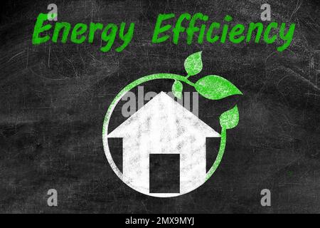 Energy efficiency concept. House drawn on blackboard Stock Photo