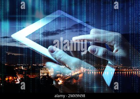 Multiple exposure of female programmer with tablet, digital binary code and night cityscape, closeup Stock Photo