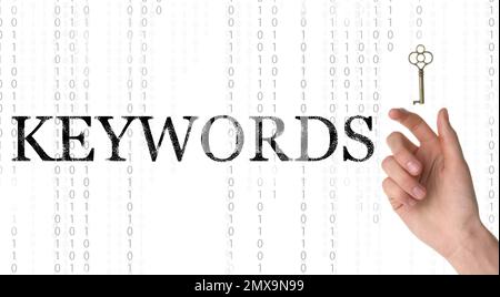 Word Keywords, key and binary code on white background. SEO direction ...