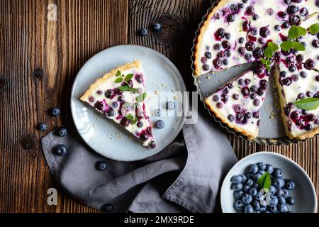 Mustikkapiirakka – traditional Finnish pie with blueberry and sour cream filling Stock Photo