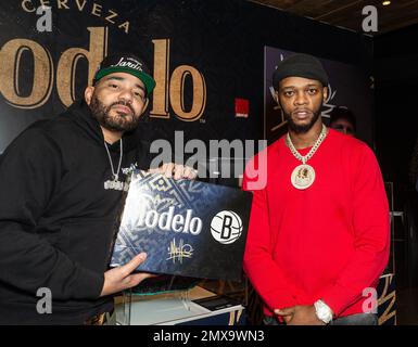 New York, United States. 30th Jan, 2023. DJ Envy and Rapper Papoose attends Modelo and Brooklyn Nets pop-up gallery curated by artist Daniel Gamache (Mache) at Barclays Center. Daniel Gamache presented his newly created sneakers and Modelo helped to create pop-up gallery with most iconic moments in Nets history.  (Photo by Lev Radin/Pacific Press) Credit: Pacific Press Media Production Corp./Alamy Live News Stock Photo