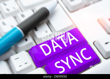 Handwriting text Data Sync. Concept meaning data that is continuously generated by different sources Stock Photo