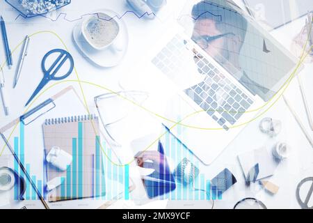 Flat lay composition with laptop and young businessman. Multiple exposure Stock Photo