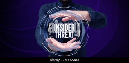 Conceptual display Insider Threat. Word for security threat that originates from within the organization Stock Photo