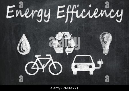 Energy efficiency concept. Different icons drawn on blackboard