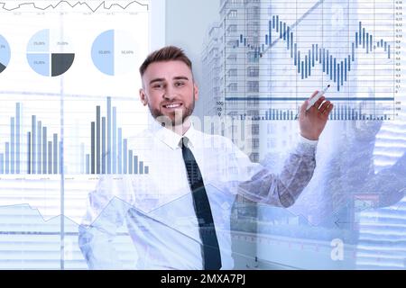 Multiple exposure of businessman, scheme and cityscape. Trade concept Stock Photo