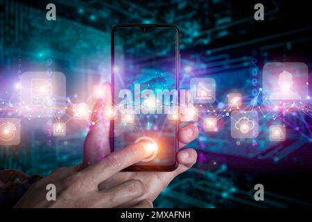 Big data technology background. Using smartphone against the background of visualization of a computer internet network, social connection, analytics, information. High quality photo Stock Photo