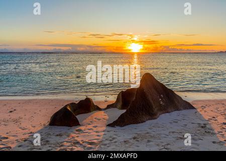 Anse Source d'Argent beach at sunset on La Digue island in the Seychelles Stock Photo