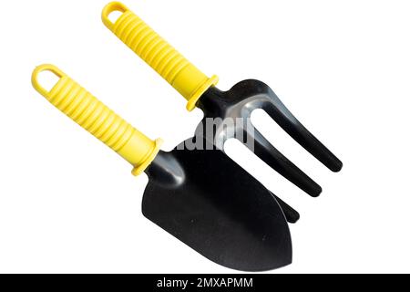 Garden shovel and fork isolated on white background Stock Photo