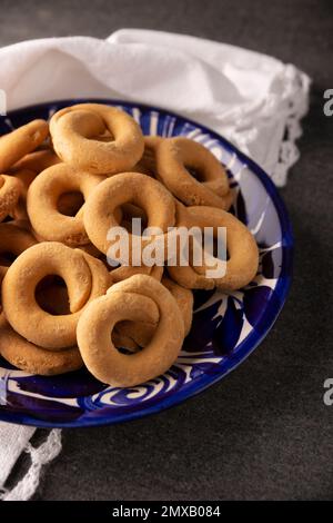 Coricos. Also known as Harinillas de maiz crudo, Tacuarines, Ensecos, Biscochos, Biscochuelos, Coricochis or Pemoles. Mexican corn cookies. Stock Photo