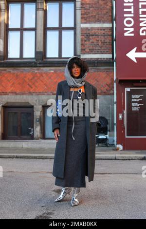 Stylish Lady with fedora hat poses for a photo during the London Fashion  Week Women's Day Four Street Style in Central London Stock Photo - Alamy