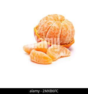 Have a slice. Studio shot of tangerines slices against a white background. Stock Photo