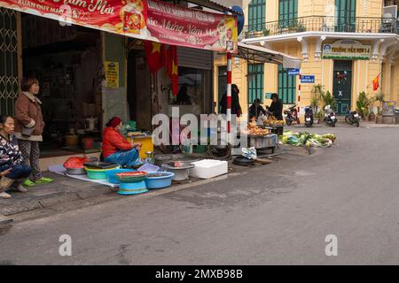 Hanoi, Vietnam, January 2023. the meat and fish vendors on the street in the old quarter in the city centre Stock Photo