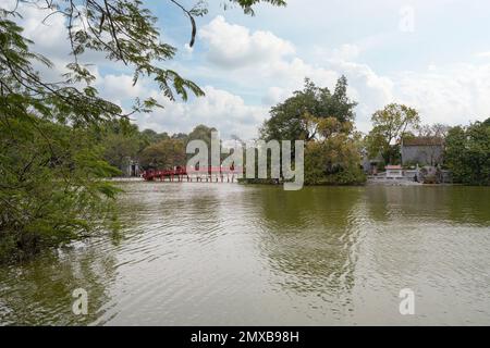 Hanoi, Vietnam, January 2023.  view of Ngoc Son Temple, Confucian temple on the Hoan Kiem lake crossed by a bridge, with tower and pavilions dedicated Stock Photo