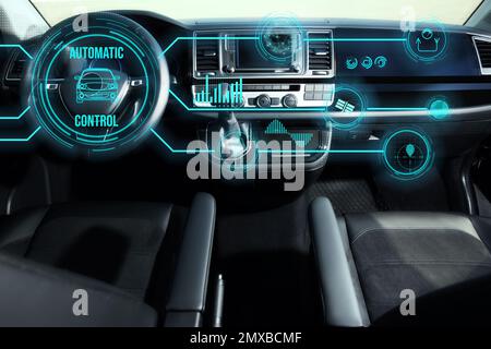 Futuristic technology. Car interior with graphical user interface Stock Photo