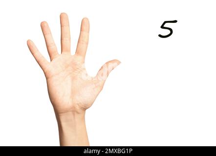 Woman showing number five on white background, closeup. Sign language Stock Photo