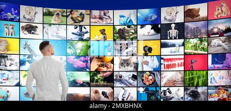 Media library concept. Man using virtual video gallery, banner design Stock Photo