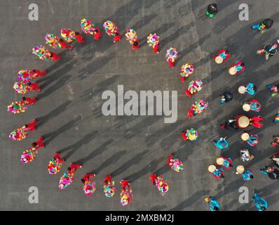 HANDAN, CHINA - FEBRUARY 3, 2023 - Villagers perform the intangible cultural heritage 'Weizi Lantern Array' to celebrate the Lantern Festival in Handa Stock Photo