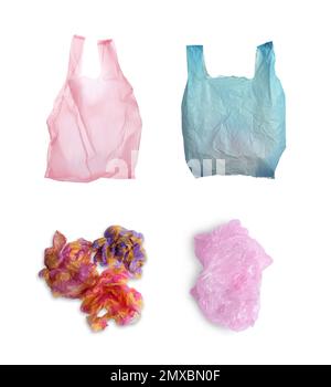 Set of disposable plastic bags on white background. Waste management and recycling Stock Photo