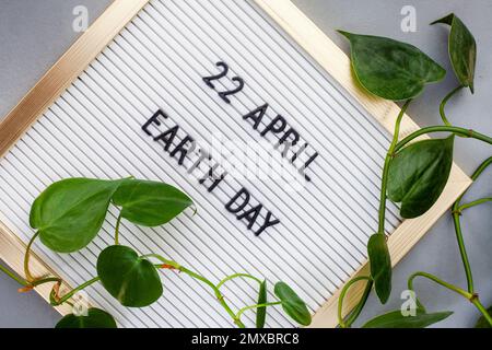 earth day 22 April, on a notice board with plants and copy space Stock Photo