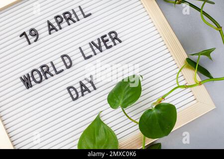 world liver day 19 April in lettering on notice board Stock Photo