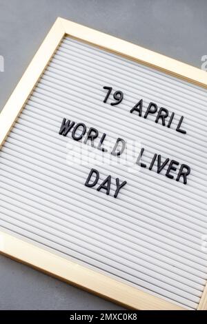 world liver day 19 April in lettering on notice board Stock Photo