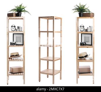 Set with wooden shelving units and different items on white background Stock Photo