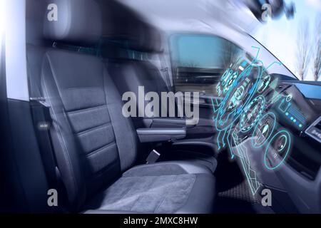 Futuristic technology. Car interior with graphical user interface Stock Photo