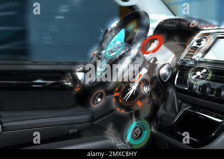 Futuristic technology. Car interior with graphical user interface Stock Photo