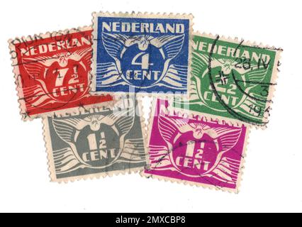 Vintage postage stamps from the Netherlands on a white background. Stock Photo