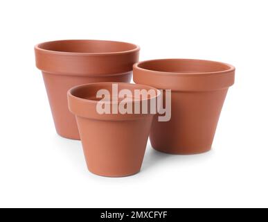 Stylish terracotta flower pots isolated on white Stock Photo - Alamy