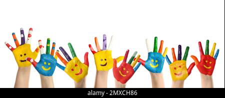 School holidays. Children with painted palms on white background, closeup Stock Photo