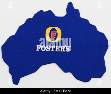 Cardboard beer coaster with logo Foster's in the shape of Australia ...