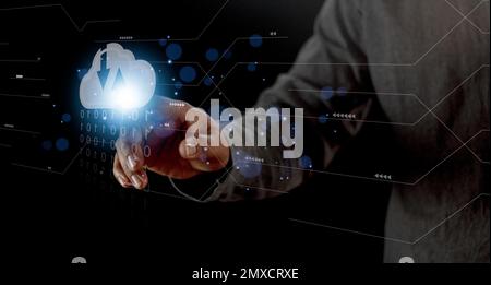 Cloud computing concept - connect to cloud. Businessman or information technologist click on cloud computing icon. Stock Photo