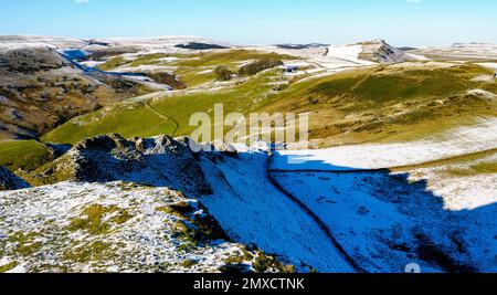 Winter view along the jagged ridge of Chrome hill or Dragon's Back towards the Staffordshire Moors near Buxton in the Derbyshire Peak District Stock Photo