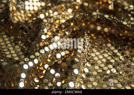 Sparkling golden sequin textile background Stock Photo by ©andre2013  187503254