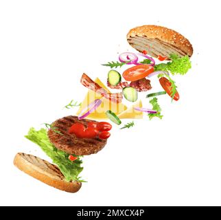 Delicious burger with different flying ingredients on white background Stock Photo
