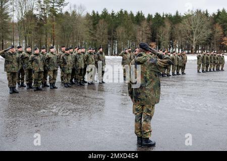 Pfreimd, Germany. 03rd Feb, 2023. Bundeswehr soldiers stand on the barracks grounds of Tank Battalion 104 during the ceremonial handover of new Bundeswehr Leopard 2 A7V tanks for the battalion. Tank Battalion 104 will gradually be equipped with Leopard 2 A7V main battle tanks over the coming months. The suffix 2 A7V indicates the 7th development stage of the Leopard 2 and the 'V' stands for 'improved'. Credit: Daniel Karmann/dpa/Alamy Live News Stock Photo