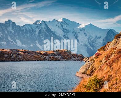 Beautiful autumn scenery. Majestic autumn view of Cheserys lake with Mount Blanc on background, Chamonix location. Great outdoor scene of Vallon de Be Stock Photo