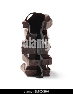Pieces of delicious dark chocolate with syrup isolated on white Stock Photo