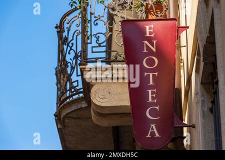 Close-up of a metal sign of an Italian wine shop (Enoteca in Italian language), Brescia downtown, Lombardy, Italy, southern Europe. Stock Photo