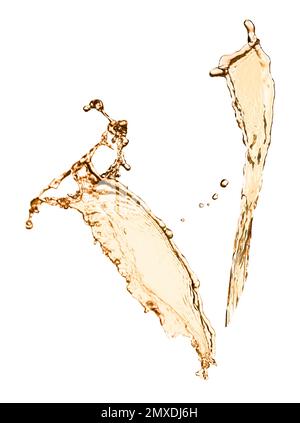 Abstract splashes of expensive whiskey on white background Stock Photo