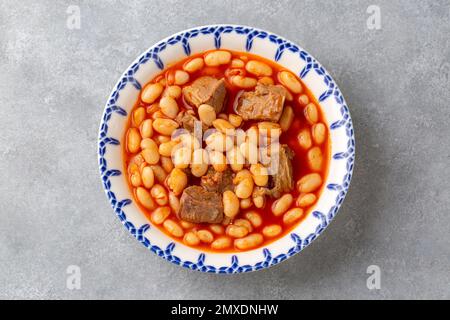 Traditional delicious Turkish food; dried bean. Turkish name; kuru fasulye yemegi Stock Photo