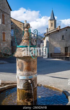 Fountain in the centre of the rural village of Quérigut in the Donezan of Ariège, southern France Stock Photo