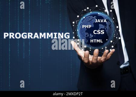 Businessman demonstrating virtual image of globe, closeup. Programming and coding Stock Photo
